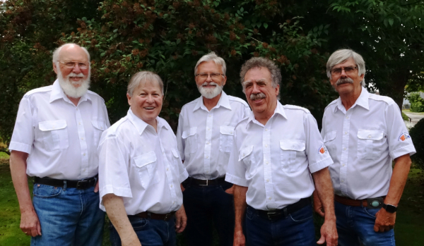 image of five men in white shirts